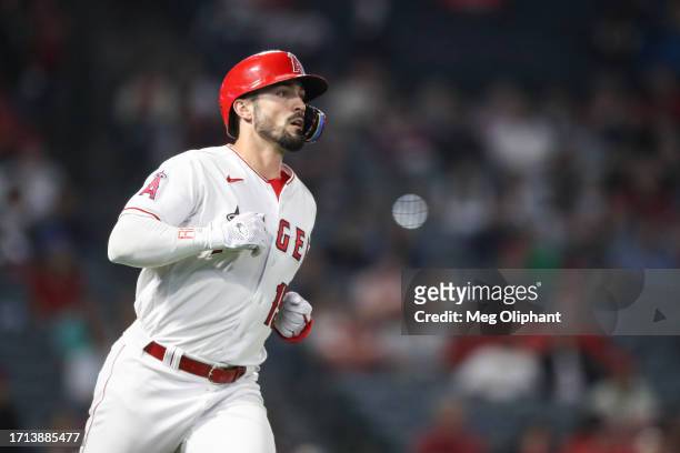 Randal Grichuk of the Los Angeles Angels watches his hit in the ninth inning against the Texas Rangers at Angel Stadium of Anaheim on September 25,...