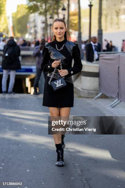 Victoria Magrath wears black dress, bag outside Louis Vuitton