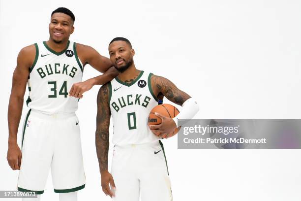 Giannis Antetokounmpo and Damian Lillard of the Milwaukee Bucks pose for portraits during media day on October 02, 2023 in Milwaukee, Wisconsin. NOTE...