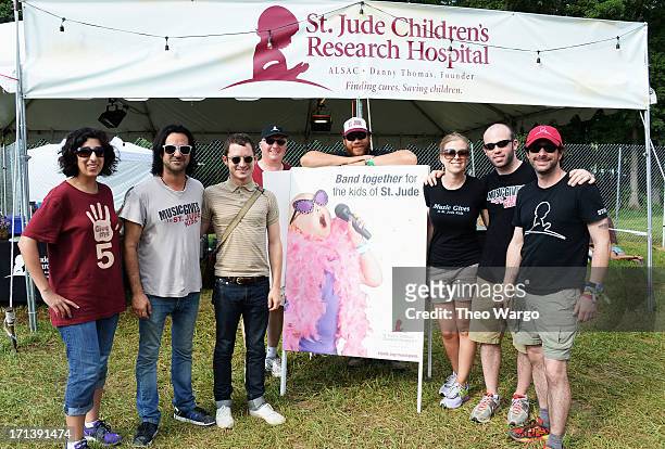 Elijah Wood hangs out at the St. Jude Children's Research Hospital tent at the Firefly Music Festival at The Woodlands of Dover International...