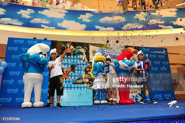 In this handout image provided by Sony Pictures Entertainment, Smurfs participate on Hong Kong Bus Tour in celebration for Global Smurfs Day 2013 on...