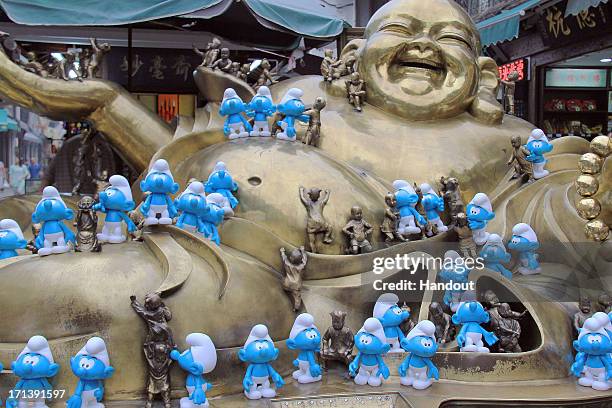 In this handout image provided by Sony Pictures Entertainment, Smurfs invade Hangzhouin in celebration for Global Smurfs Day 2013 on June 22, 2013 in...