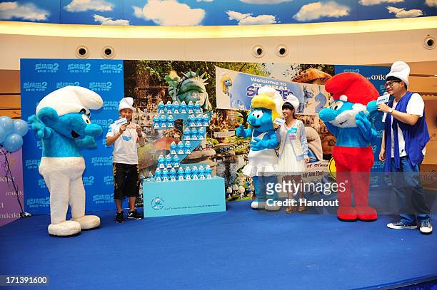 In this handout image provided by Sony Pictures Entertainment, Smurfs participate on Hong Kong Bus Tour in celebration for Global Smurfs Day 2013 on...