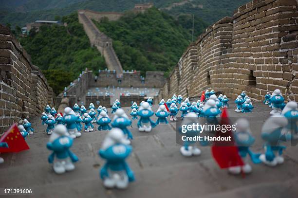In this handout image provided by Sony Pictures Entertainment, Smurfs invade the Beijing Great Wall in celebration for Global Smurfs Day 2013 on June...