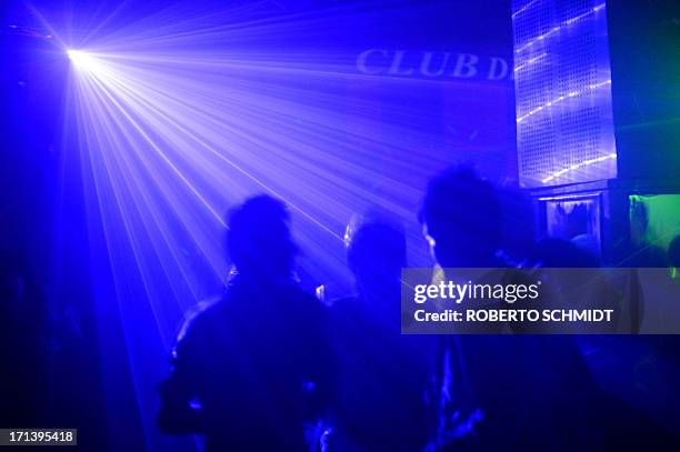 Bhutan-politics-economy-health-labour-social-youth,FEATURE by Rachel O'BRIEN Bhutanese youngsters dance in a nightclub in Thimphu on June 2, 2013. It...