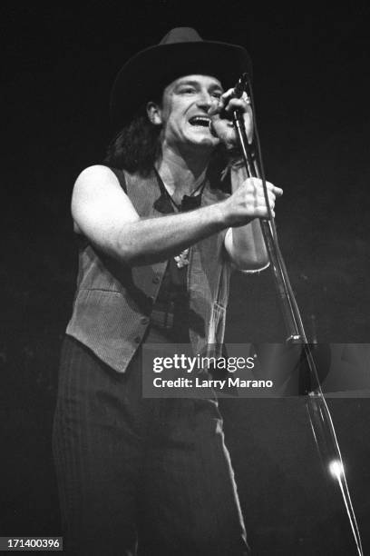 Bono of U2 performs on the Joshua Tree Tour at Nassau Coliseum on October 9, 1987 in Uniondale NY. .