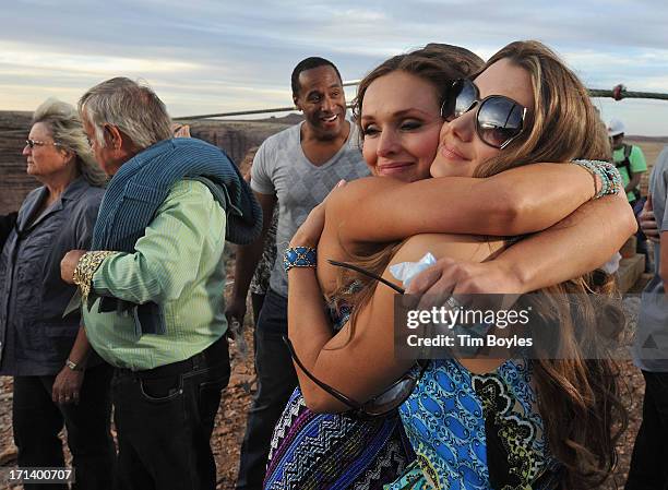 Nik Wallenda's wife Erendira Wallenda hugs Lijana Hernandez, Nik's sister following Nik Wallenda's historic walk at The Grand Canyon on June 23, 2013...