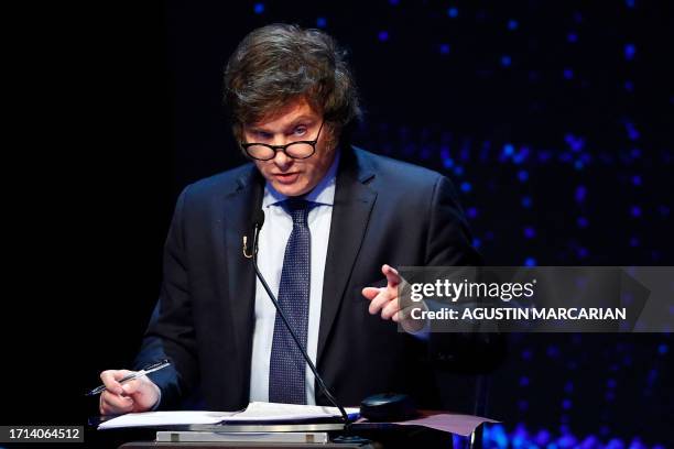 Argentine legislator and presidential candidate for the La Libertad Avanza party, Javier Milei, gestures during the presidential debate at the...