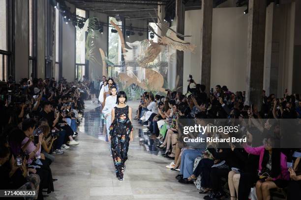 Models walk the runway during the Shiatzy Chen Womenswear Spring/Summer 2024 show at Palais de Tokyo as part of Paris Fashion Week on October 02,...