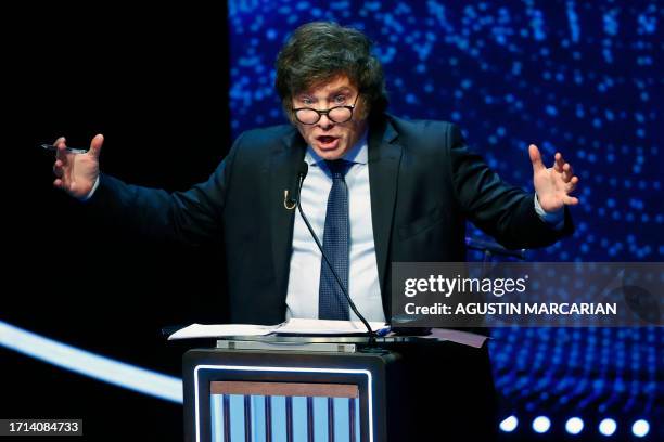 Argentine legislator and presidential candidate for the La Libertad Avanza party, Javier Milei, gestures during the presidential debate at the...