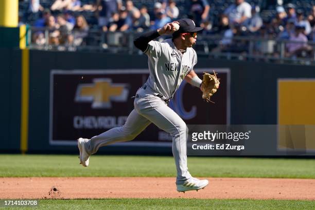 Oswald Peraza of the New York Yankees throws to first in the second inning against the Kansas City Royals at Kauffman Stadium on October 01, 2023 in...