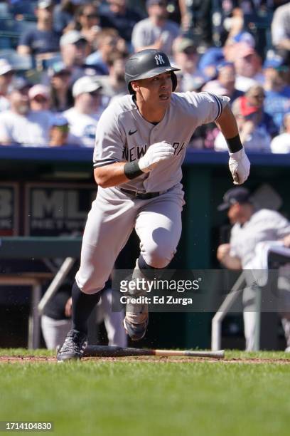 Anthony Volpe of the New York Yankees runs after hitting a single against the Kansas City Royals in the first inning at Kauffman Stadium on October...