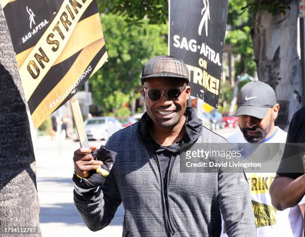 Amin Joseph joins the picket line outside Warner Bros. Studios on October 02, 2023 in Burbank, California. The WGA has reached a deal with Hollywood...