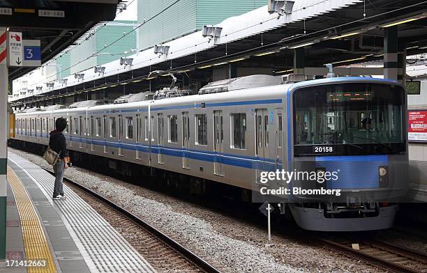 Seibu Railway Co. Train arrives at Nerima Station in Tokyo, Japan, on Monday, June 24, 2013. Cerberus Capital Management LP is battling Seibu...