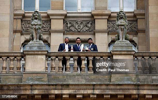 Shikhar Dhawan, MS Dhoni and Ravindra Jadeja of India during ICC Champions Trophy Winners Photocall at the Birmingham City Council Building on June...