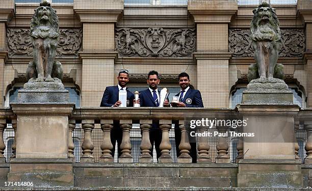 Shikhar Dhawan, MS Dhoni and Ravindra Jadeja of India during ICC Champions Trophy Winners Photocall at the Birmingham City Council Building on June...