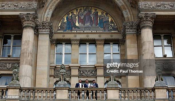 Shikhar Dhawan, MS Dhoni and Ravindra Jadeja of India during ICC Champions Trophy Winners Photocall at the Birmingham City Council Building on June...