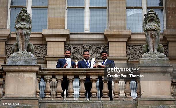 Shikhar Dhawan, MS Dhoni and Ravindra Jadeja of India during ICC Champions Trophy Winners Photocall at the Birmingham City Council Building on June...