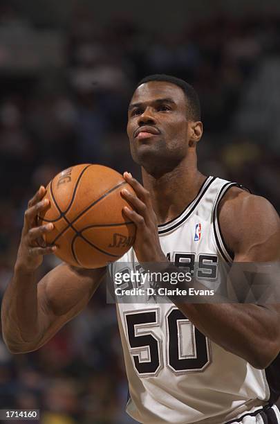David Robinson of the San Antonio Spurs shoots a free throw during the game against the Washington Wizards on December 21, 2002 at SBC Center in San...