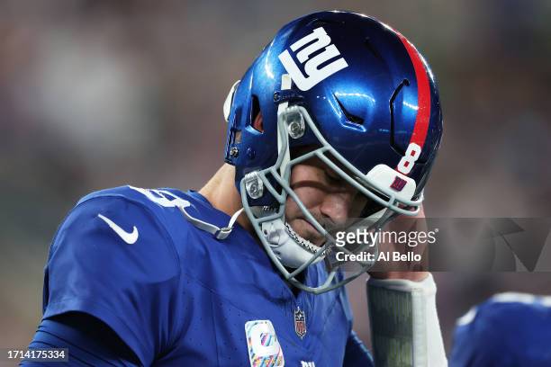 Daniel Jones of the New York Giants walks off the field during the second quarter against the Seattle Seahawks at MetLife Stadium on October 02, 2023...
