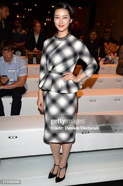 Emi Takei attends the Gucci show during Milan Menswear Fashion Week Spring Summer 2014 show on June 24, 2013 in Milan, Italy.