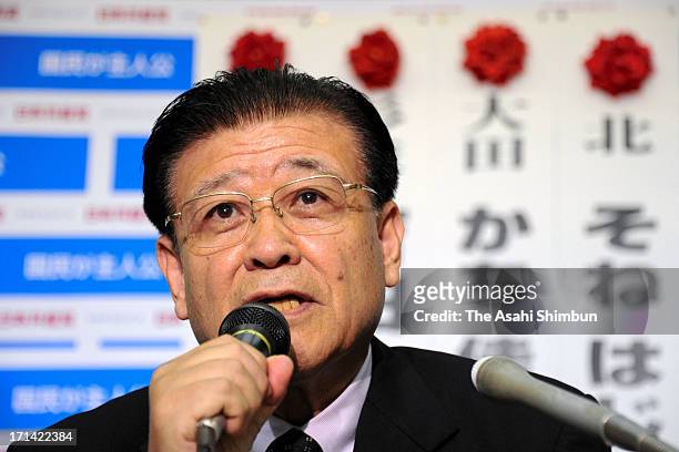 Japanese Communist Party head of secretariat Tadayoshi Ichida speaks during a press conference at their headquarters on June 23, 2013 in Tokyo,...