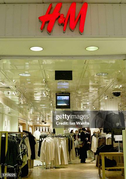 Shoppers look for bargains at an H&M store along Croydon's High Street January 8, 2003 in Croydon, United Kingdom. Big name High Street retailers...