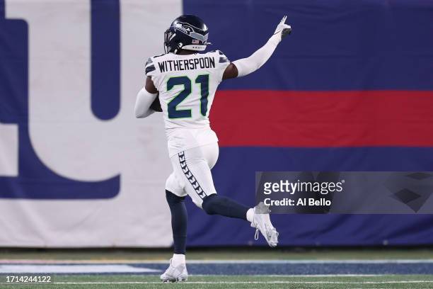 Devon Witherspoon of the Seattle Seahawks returns an interception 97-yards for a touchdown during the third quarter against the New York Giants at...