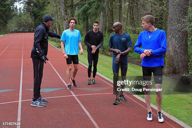 Coach Alberto Salazar of the Nike Oregon Project directs athletes Cam Levins of the Canada, Matthew Centrowitz of the USA, Mo Farah of Great Britain...