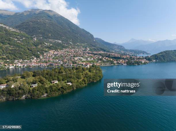 aerial view over the village of ossuccio on lake como in italy - menaggio stock pictures, royalty-free photos & images