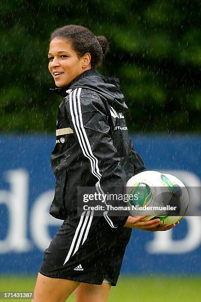 Celia Okoyino da Mbabi looks on during the German women's national team training session at HVB Club Sportzentrum on June 24, 2013 in Munich, Germany.