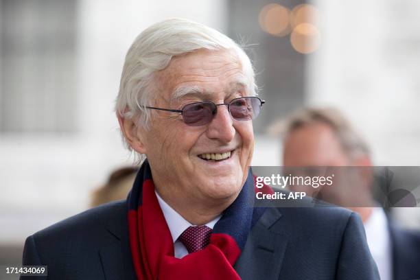 British TV presenter Michael Parkinson arrives at a memorial service for the South African born, former England cricket captain Tony Greig, at Saint...