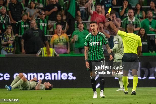 Midfielder Emiliano Rigoni reacts after receiving a yellow card during the MLS match between Austin FC and Los Angeles FC at Q2 Stadium on October 7,...