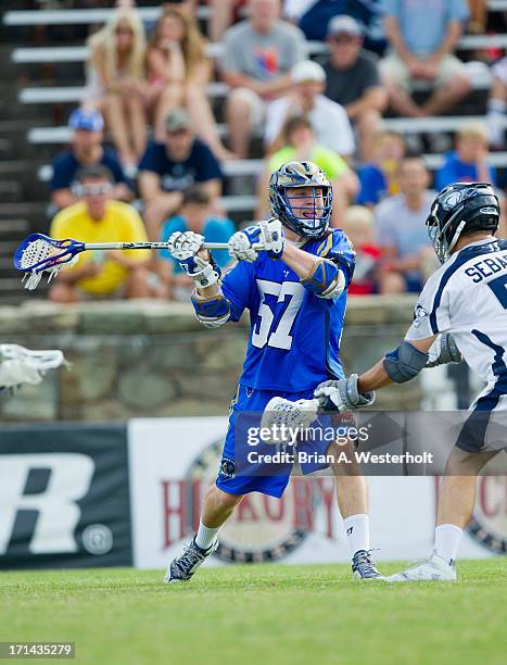 Peet Poillon of the Charlotte Hounds winds up to take a shot on goal against the Chesapeake Bayhawks at American Legion Memorial Stadium on June 22,...