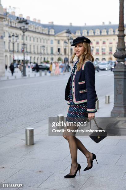 Influencer Alexandra Lapp, is seen wearing MAISON COMMON tweed jacket with contrast trim in navy, MAISON COMMON easy silk shell dot print blouse in...