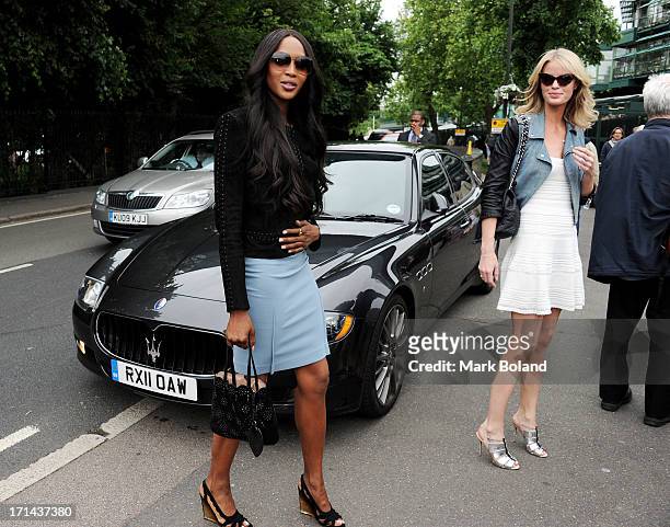 Models Naomi Campbell and Caroline Winberg are sighted arriving in a Maserati to Wimbledon on June 24, 2013 in London, England.