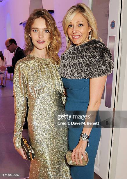 Natalia Vodianova and Nadja Swarovski attend the 'Arts For Life' charity auction hosted by Susan Hayden, Nadja Swarovski and Natalia Vodianova to...