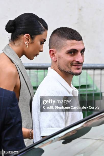 Jessica Aidi and Marco Verratti attend the Louis Vuitton Womenswear Spring/Summer 2024 show as part of Paris Fashion Week on October 02, 2023 in...