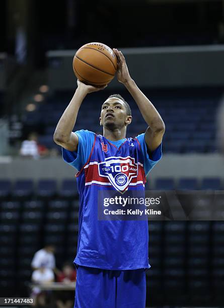 Dominique Collier shoots a free throw during the NBPA Top 100 Camp on June 15, 2013 at John Paul Jones Arena in Charlottesville, Virginia.