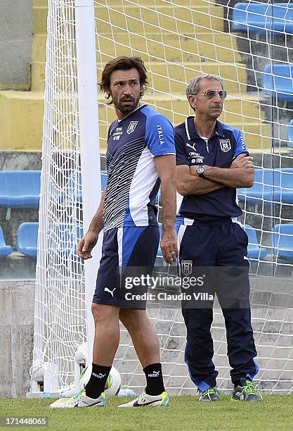 Andrea Pirlo and doctor Enrico Castellacci of Italy attend a training session ahead of their Confederations Cup match against Spain, at Estadio...