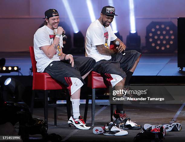 Mike Miller and Udonis Haslem of the Miami Heat attend the NBA Championship victory rally at the AmericanAirlines Arena on June 24, 2013 in Miami,...