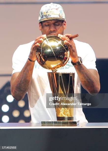 LeBron James of the Miami Heat celebrates the NBA Championship victory rally at the AmericanAirlines Arena on June 24, 2013 in Miami, Florida. The...