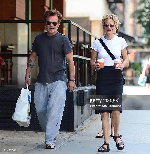 Meg Ryan and John Mellencamp are seen in Tribeca on June 24, 2013 in New York City.
