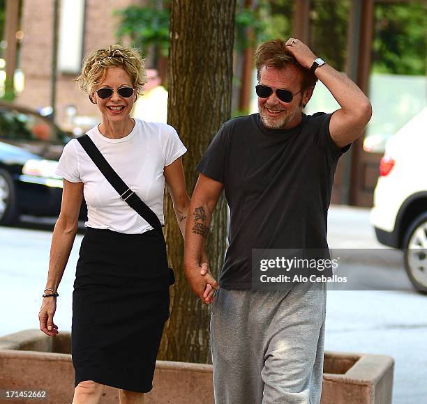 Meg Ryan and John Mellencamp are seen in Tribeca on June 24, 2013 in New York City.