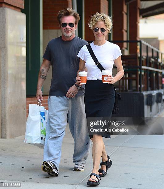 Meg Ryan and John Mellencamp are seen in Tribeca on June 24, 2013 in New York City.