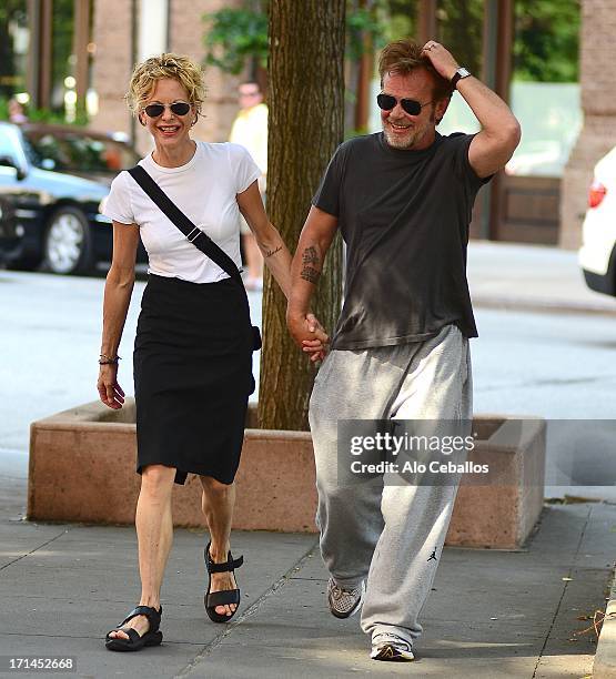 Meg Ryan and John Mellencamp are seen in Tribeca on June 24, 2013 in New York City.