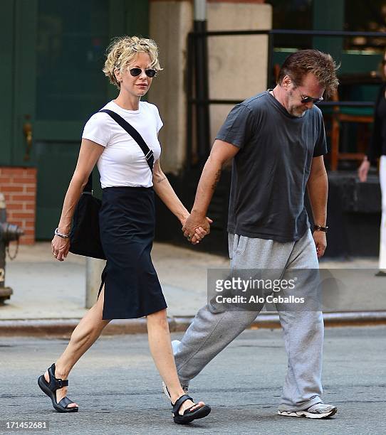 Meg Ryan and John Mellencamp are seen in Tribeca on June 24, 2013 in New York City.