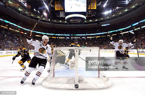 Jonathan Toews of the Chicago Blackhawks celebrates after scoring a goal in the second period against Tuukka Rask of the Boston Bruins in Game Six of...