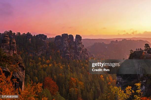 travel destination: sunrise in the elbe sandstone mountains (german: elbsandsteingebirge), saxony/ germany - saxony stock pictures, royalty-free photos & images