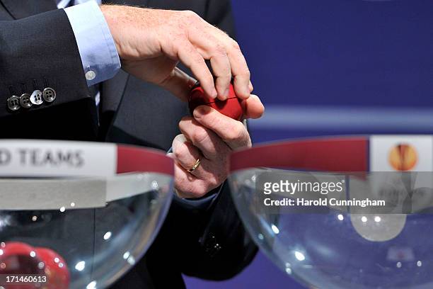 Gianni Infantino, UEFA General Secretary, opens a draw ball during the UEFA Europa League Q1 qualifying round draw at the UEFA headquarters on June...